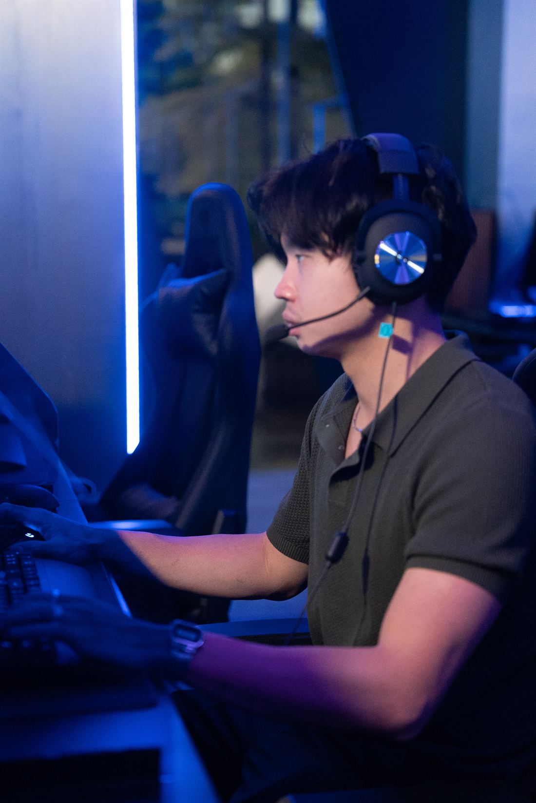 Focused gamer at Portal Gaming Center Bali