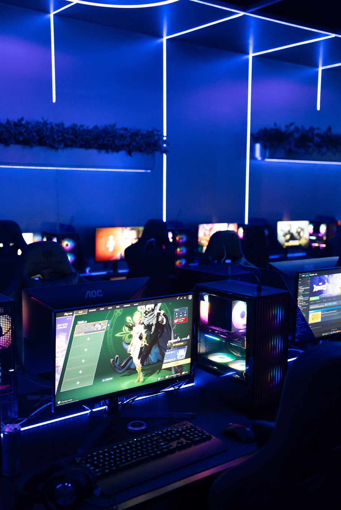 Neon-lit gaming stations at Portal Gaming Center Canggu
