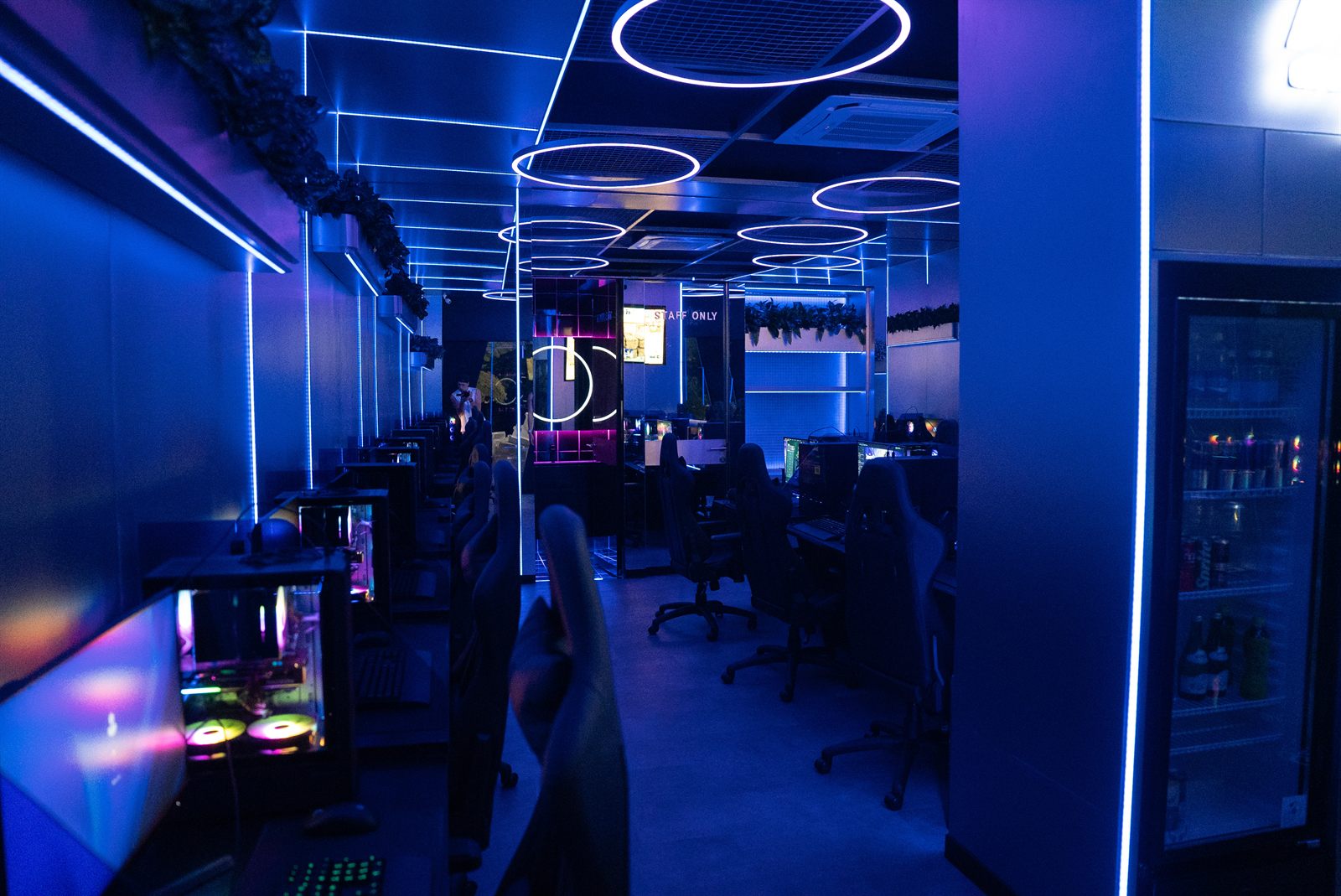 Neon-lit interior and gaming stations at Portal Gaming Center Canggu